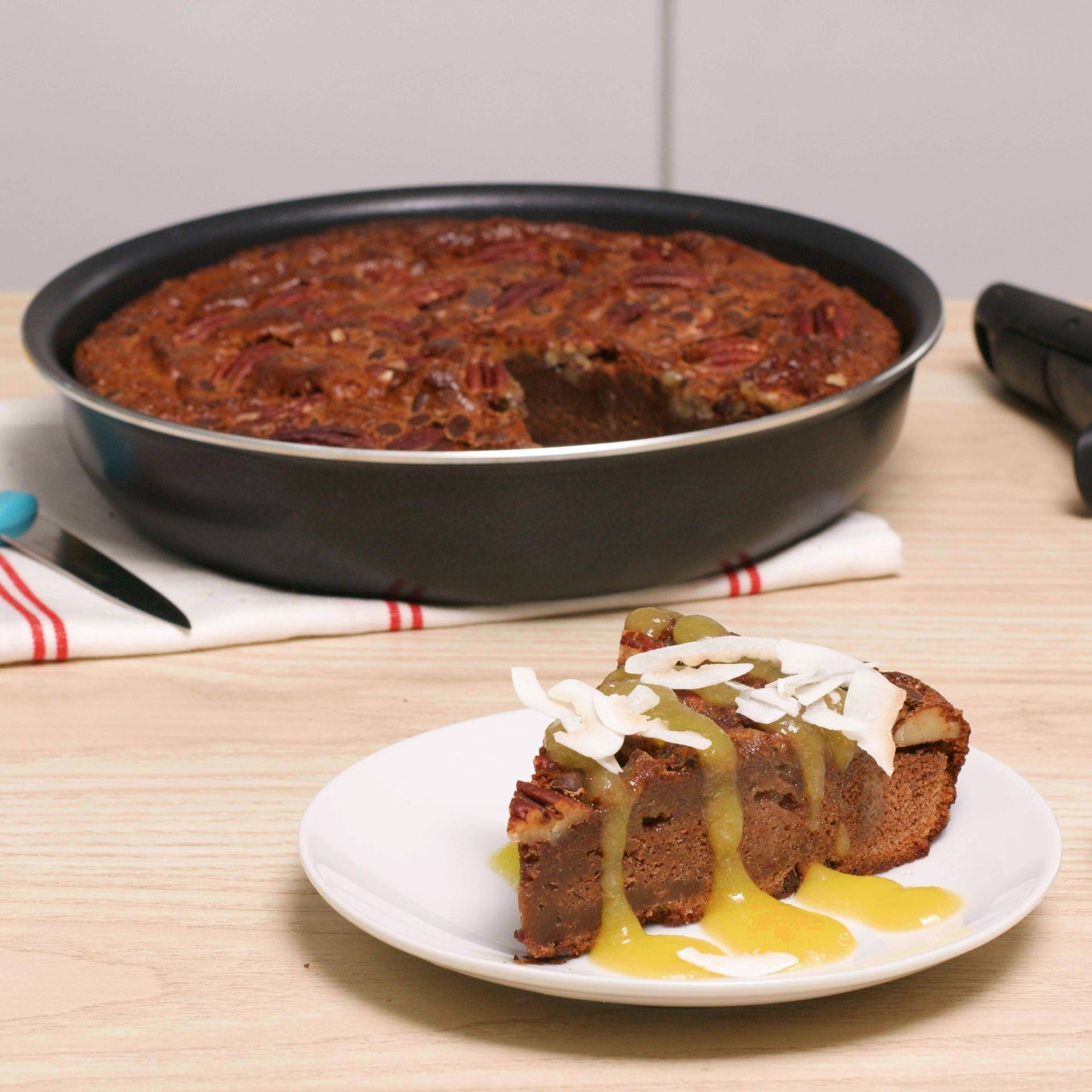 Brownie au chocolat au lait, coco et coulis mangue - Recette Poêles et Casseroles | Tefal