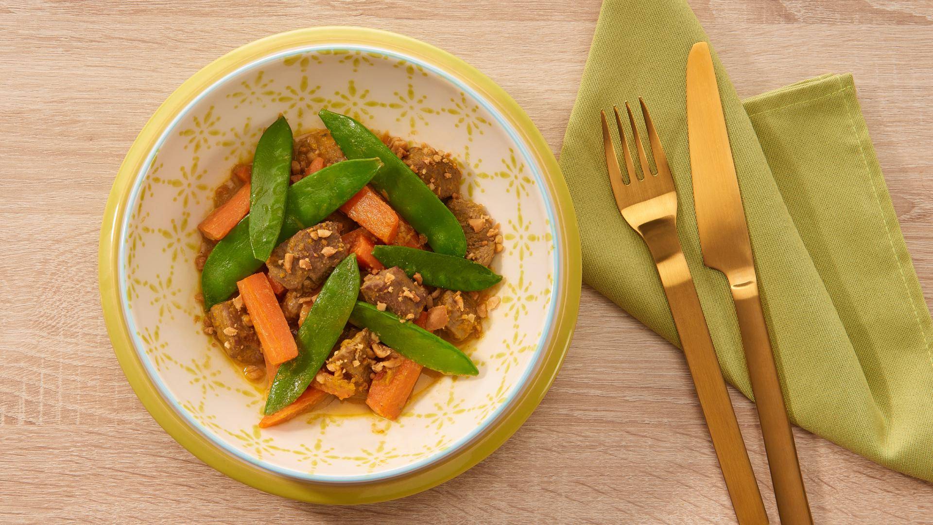 Wok d'agneau et carottes aux agrumes et cacahuètes - Recette Poêles et Casseroles | Tefal